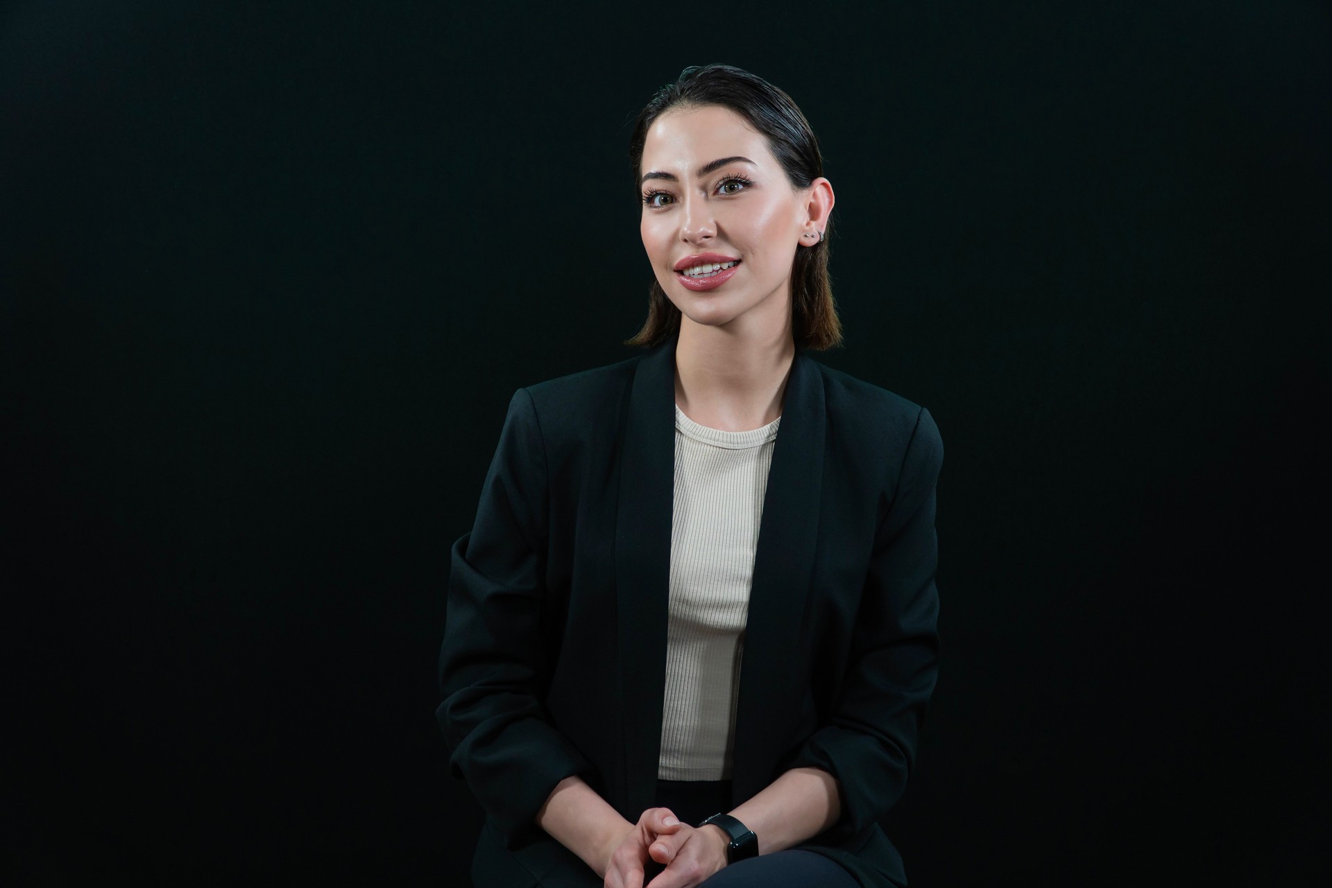 Businesswomen, Portrait of young smiling businesswoman. Business Concept, Black Background.